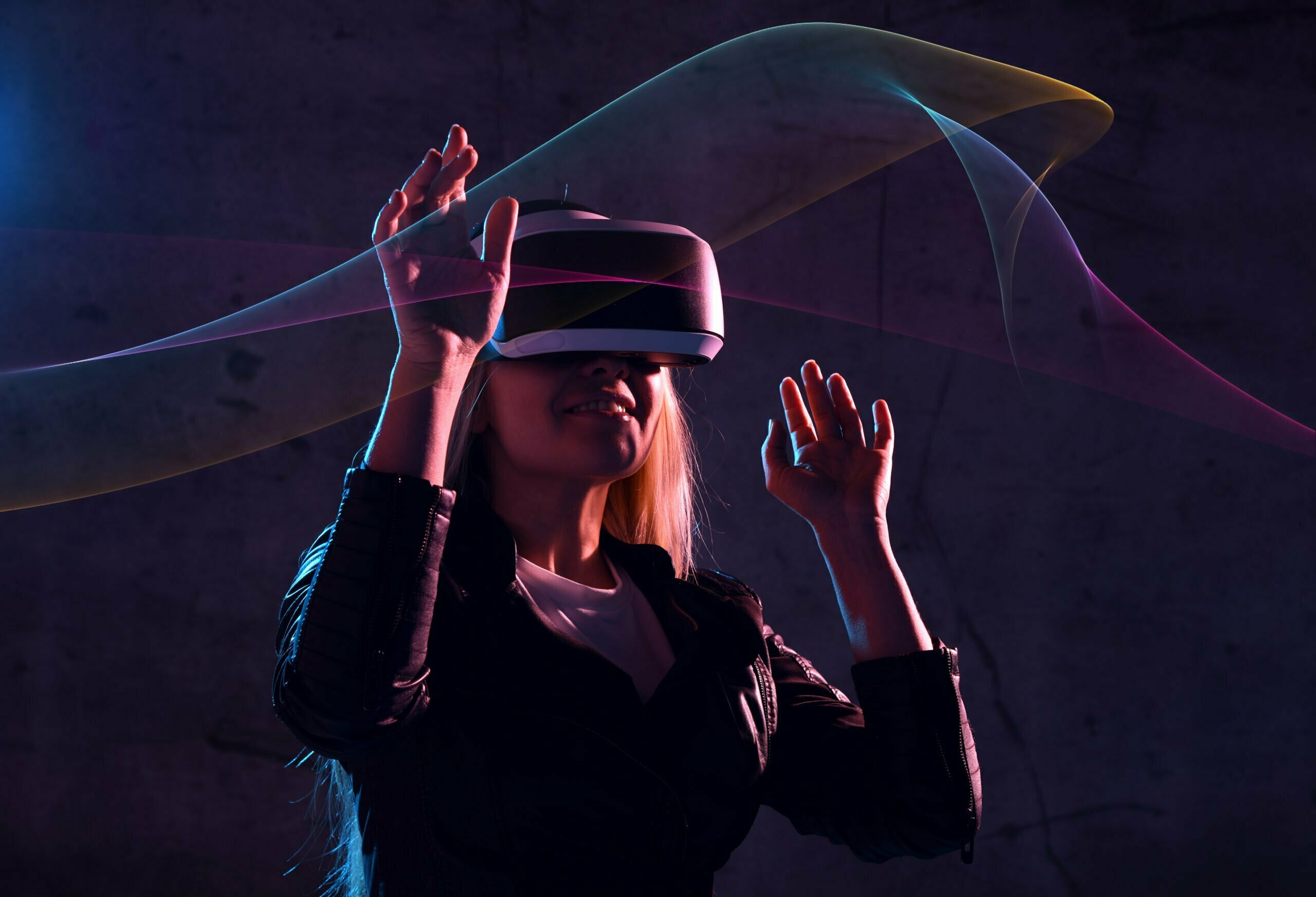 Young girl play virtual reality game wear vr glasses and explore alternative reality. woman in cyber space and virtual gaming
