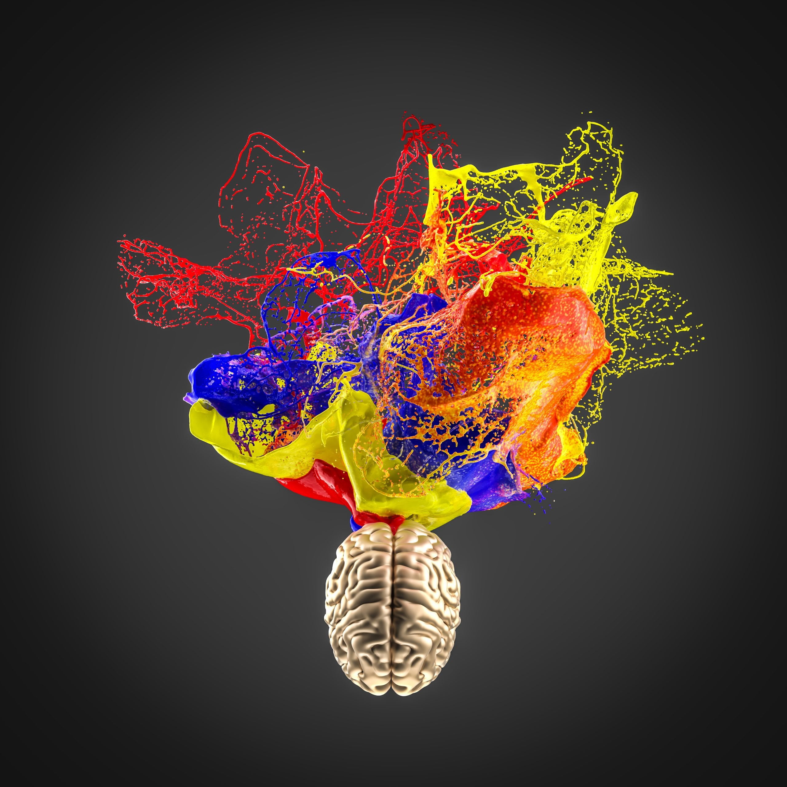 3d image of a gold colored human brain and an explosion of color.